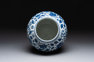 A large Chinese blue and white jar with Buddhist symbols and foliage, Jiajing/Wanli period