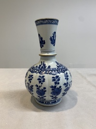 A pair of Chinese blue and white hookah bases with floral design, Kangxi