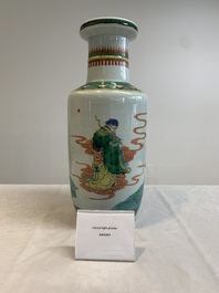 A Chinese famille verte rouleau vase with immortals, 19th C.
