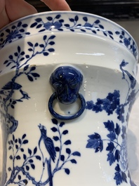 A pair of Chinese blue and white 'birds among flowering branches' jardini&egrave;res, 19th C.