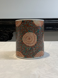A Chinese famille verte coral-red-ground 'chrysanthemum scroll' brush pot, Kangxi