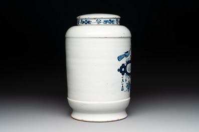 A rare large blue and white Dutch Delft albarello with original cover, 18th C.