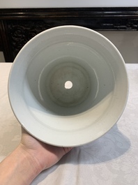 A pair of Chinese blue and white 'birds among flowering branches' jardini&egrave;res, 19th C.