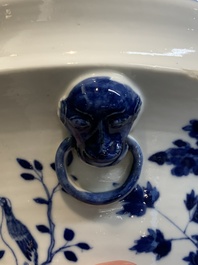 A pair of Chinese blue and white 'birds among flowering branches' jardini&egrave;res, 19th C.