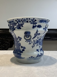 A pair of Chinese blue and white 'birds among flowering branches' jardini&egrave;res, 19th C.