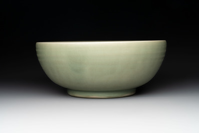 A Chinese Longquan celadon bowl with 'anhua' floral design, Ming
