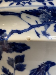 A pair of Chinese blue and white 'birds among flowering branches' jardini&egrave;res, 19th C.