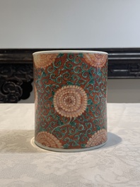 A Chinese famille verte coral-red-ground 'chrysanthemum scroll' brush pot, Kangxi