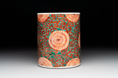 A Chinese famille verte coral-red-ground 'chrysanthemum scroll' brush pot, Kangxi