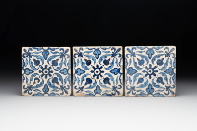Five blue and white Dutch Delft tiles with floral design, 17th C.