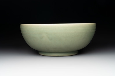 A Chinese Longquan celadon bowl with 'anhua' floral design, Ming