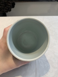 A Chinese famille verte coral-red-ground 'chrysanthemum scroll' brush pot, Kangxi