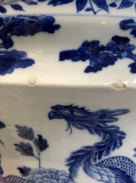 A pair of Chinese blue and white 'birds among flowering branches' jardini&egrave;res, 19th C.