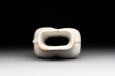 Three Chinese Longquan celadon saucers and an archaistic ge-type vase, Ming/Qing