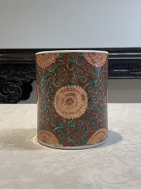 A Chinese famille verte coral-red-ground 'chrysanthemum scroll' brush pot, Kangxi