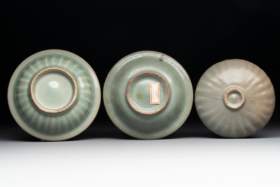 Three Chinese Longquan celadon saucers and an archaistic ge-type vase, Ming/Qing