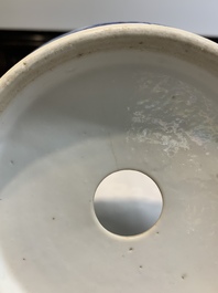 A pair of Chinese blue and white 'birds among flowering branches' jardini&egrave;res, 19th C.