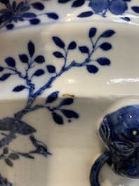 A pair of Chinese blue and white 'birds among flowering branches' jardini&egrave;res, 19th C.