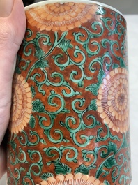 A Chinese famille verte coral-red-ground 'chrysanthemum scroll' brush pot, Kangxi