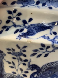 A pair of Chinese blue and white 'birds among flowering branches' jardini&egrave;res, 19th C.