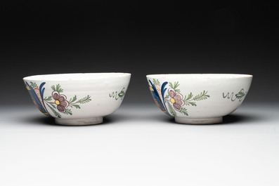 A pair of polychrome Dutch Delft 'duck hunt' bowls, 18th C.