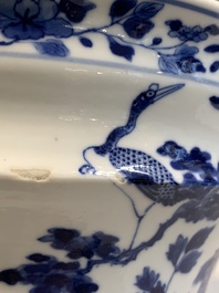 A pair of Chinese blue and white 'birds among flowering branches' jardini&egrave;res, 19th C.