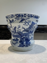 A pair of Chinese blue and white 'birds among flowering branches' jardini&egrave;res, 19th C.