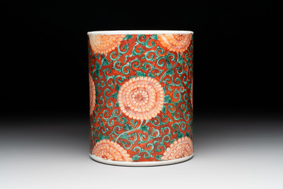 A Chinese famille verte coral-red-ground 'chrysanthemum scroll' brush pot, Kangxi
