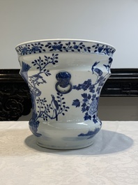 A pair of Chinese blue and white 'birds among flowering branches' jardini&egrave;res, 19th C.