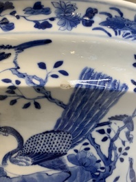 A pair of Chinese blue and white 'birds among flowering branches' jardini&egrave;res, 19th C.