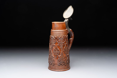 A Beauvais stoneware tankard, France, 19th C.