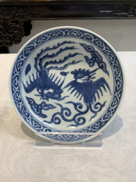 A pair of Chinese blue and white 'phoenix' plates, Wanli mark and of the period