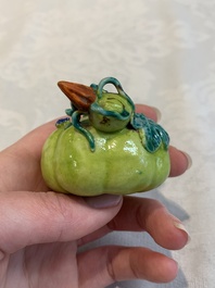 A collection of five Chinese famille rose peaches and pumpkins, including a box and cover, 19th C.