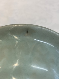 Three Chinese Longquan celadon saucers and an archaistic ge-type vase, Ming/Qing