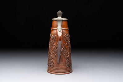 A Beauvais stoneware tankard, France, 19th C.
