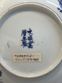 A pair of Chinese blue and white 'phoenix' plates, Wanli mark and of the period