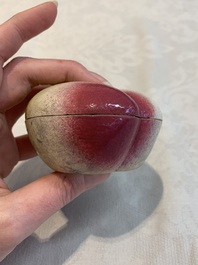 A collection of five Chinese famille rose peaches and pumpkins, including a box and cover, 19th C.
