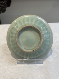 Three Chinese Longquan celadon saucers and an archaistic ge-type vase, Ming/Qing