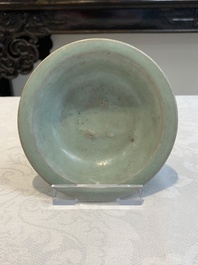 Three Chinese Longquan celadon saucers and an archaistic ge-type vase, Ming/Qing