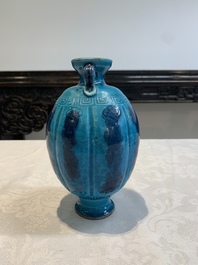 A Chinese turquoise-glazed brush rest and a Fahau vase, 18/19th C.