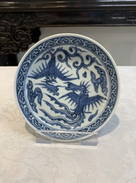 A pair of Chinese blue and white 'phoenix' plates, Wanli mark and of the period