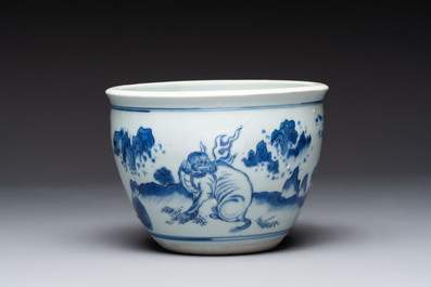 A Chinese blue and white 'Buddhist lion and elephant' scroll jar or jardini&egrave;re, Transitional period