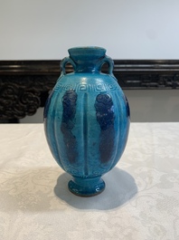 A Chinese turquoise-glazed brush rest and a Fahau vase, 18/19th C.