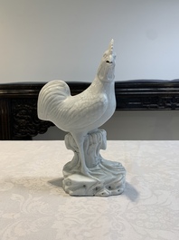 A pair of Chinese Dehua blanc de Chine models of roosters, 18th C.
