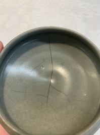 Three Chinese Longquan celadon saucers and an archaistic ge-type vase, Ming/Qing