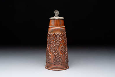 A Beauvais stoneware tankard, France, 19th C.