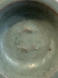 Three Chinese Longquan celadon saucers and an archaistic ge-type vase, Ming/Qing