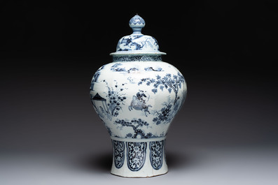 A large blue and white Dutch Delft chinoiserie vase and cover, late 17th C.