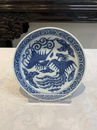 A pair of Chinese blue and white 'phoenix' plates, Wanli mark and of the period