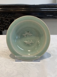 Three Chinese Longquan celadon saucers and an archaistic ge-type vase, Ming/Qing